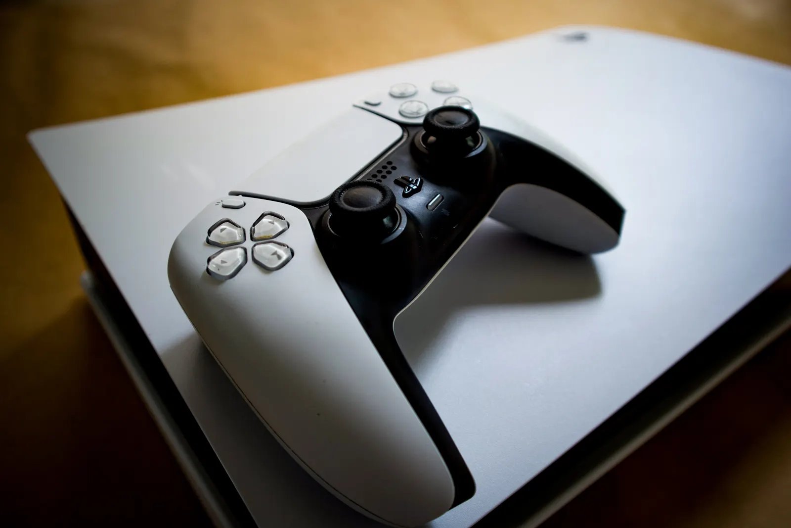 PlayStation 5 console and DualSense controller brought in for game console repair at UTTECH in West Valley City, Utah